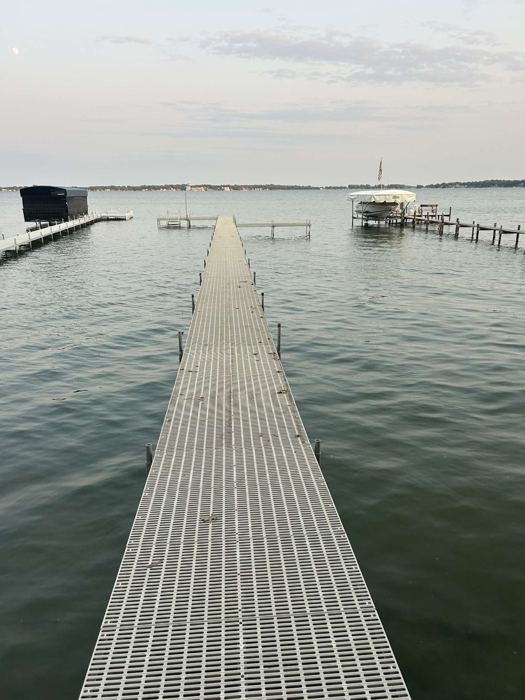 Modular lake dock installation with T-config end on Clear Lake